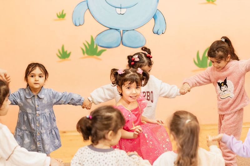 Toddlers painting together