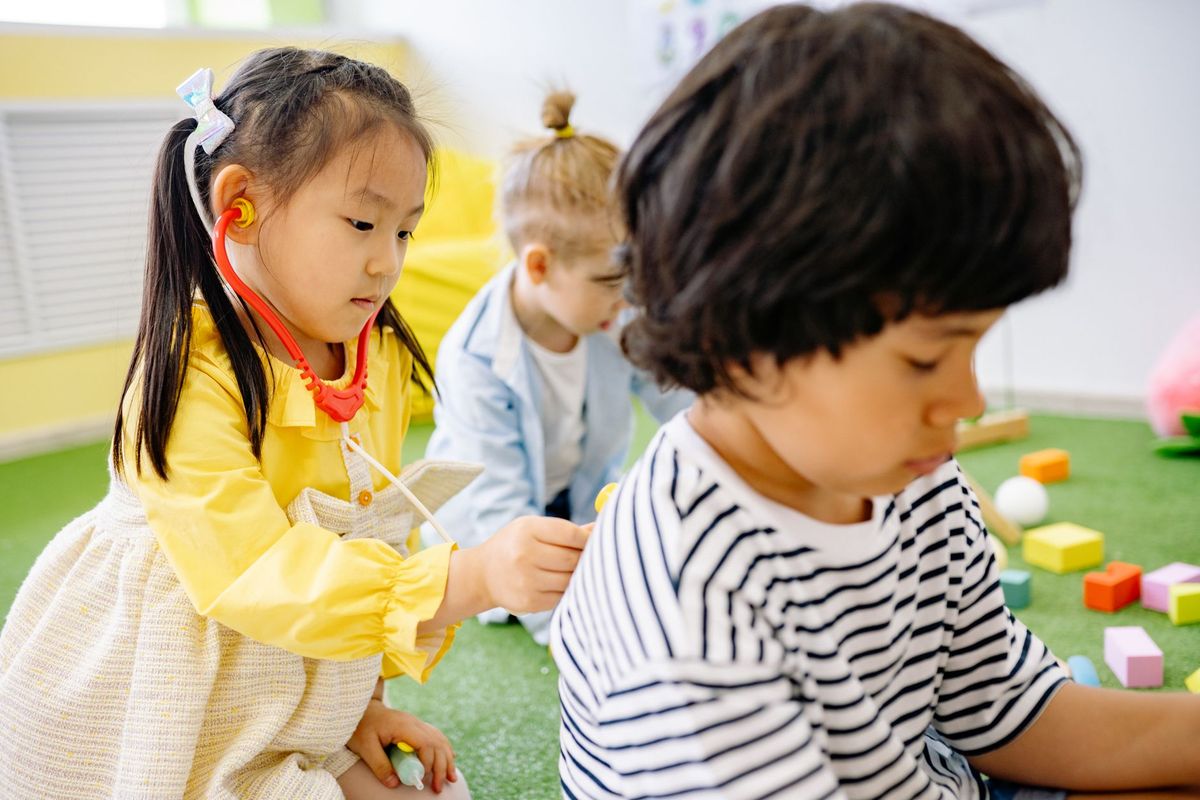Children playing happily in daycare