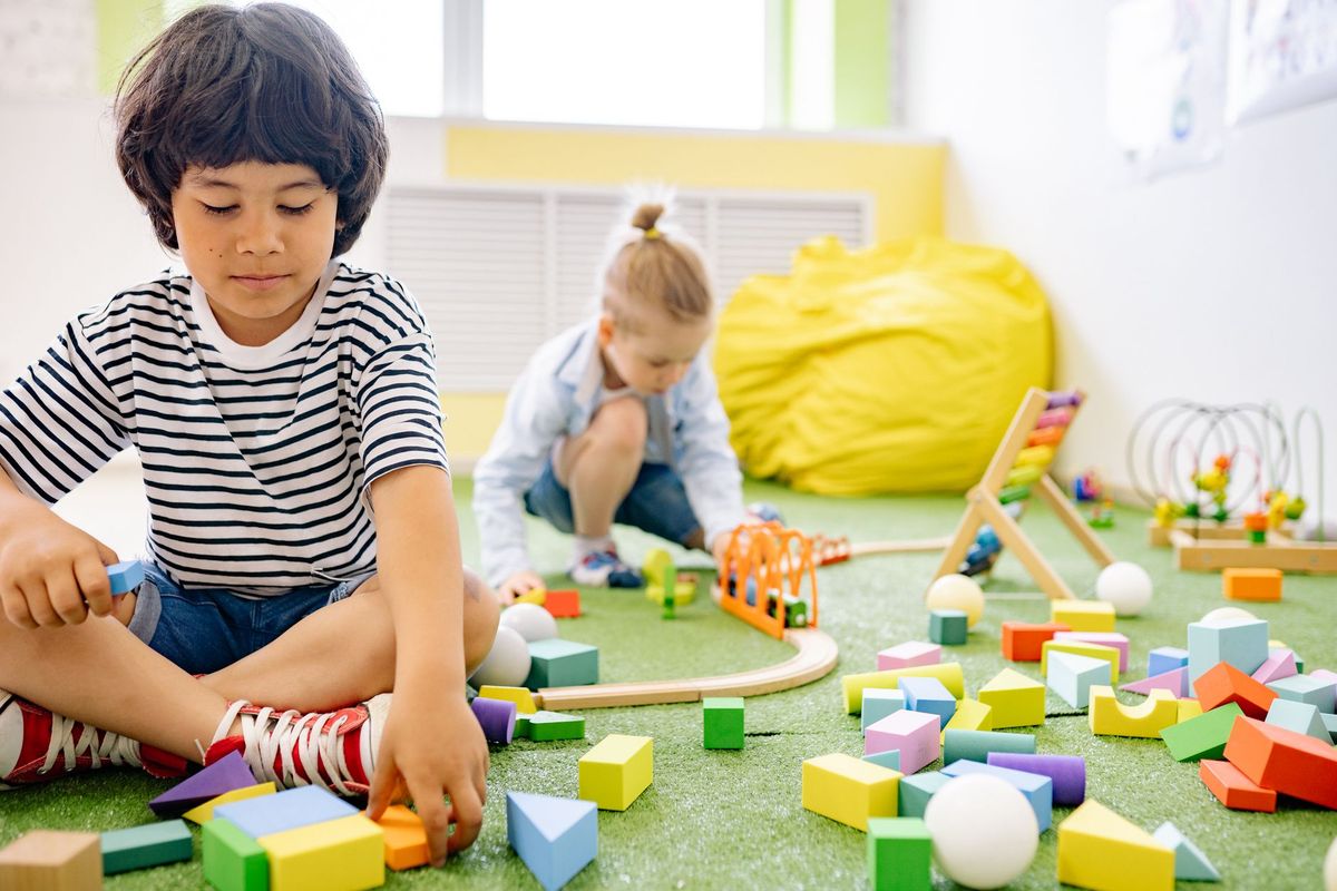 Happy toddlers enjoying learning