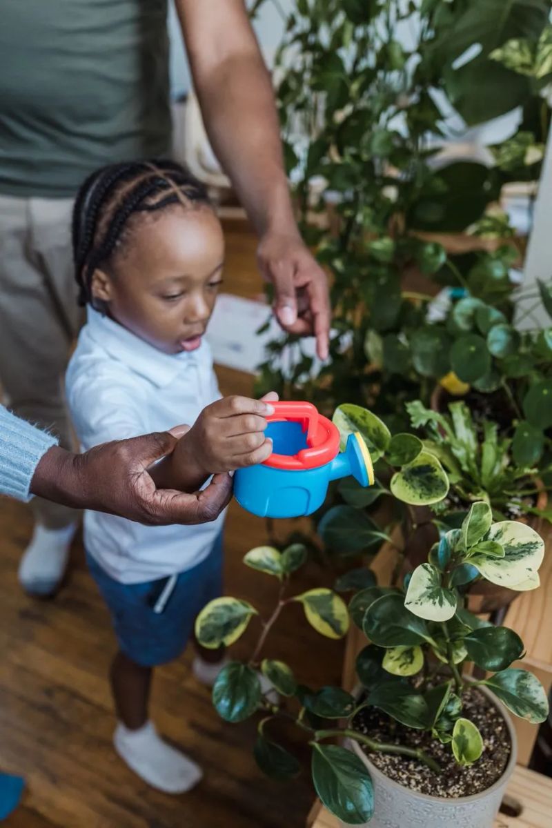 An enthusiastic educator engaging with preschoolers